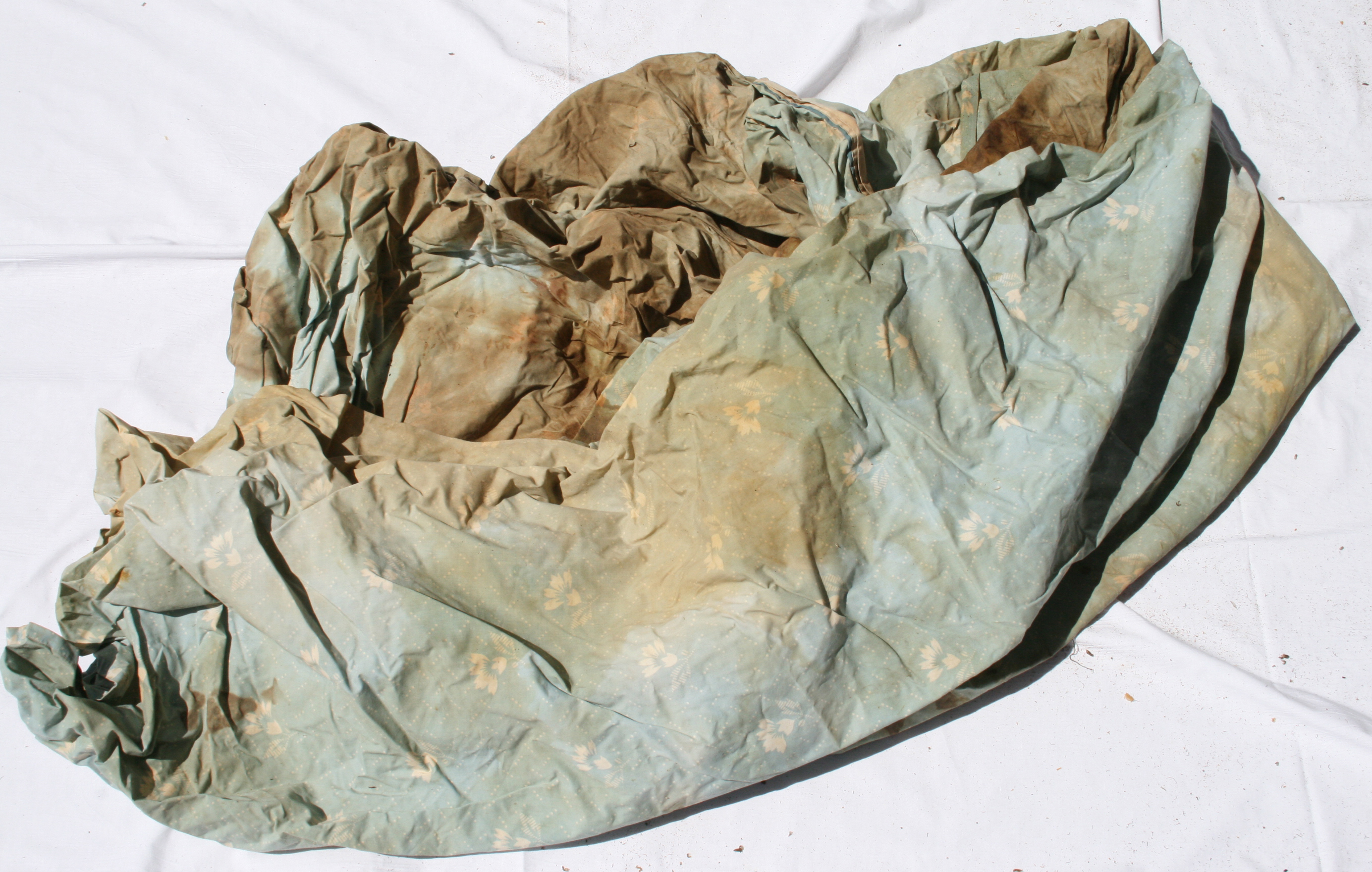 NamUs UP10065 — bed sheet