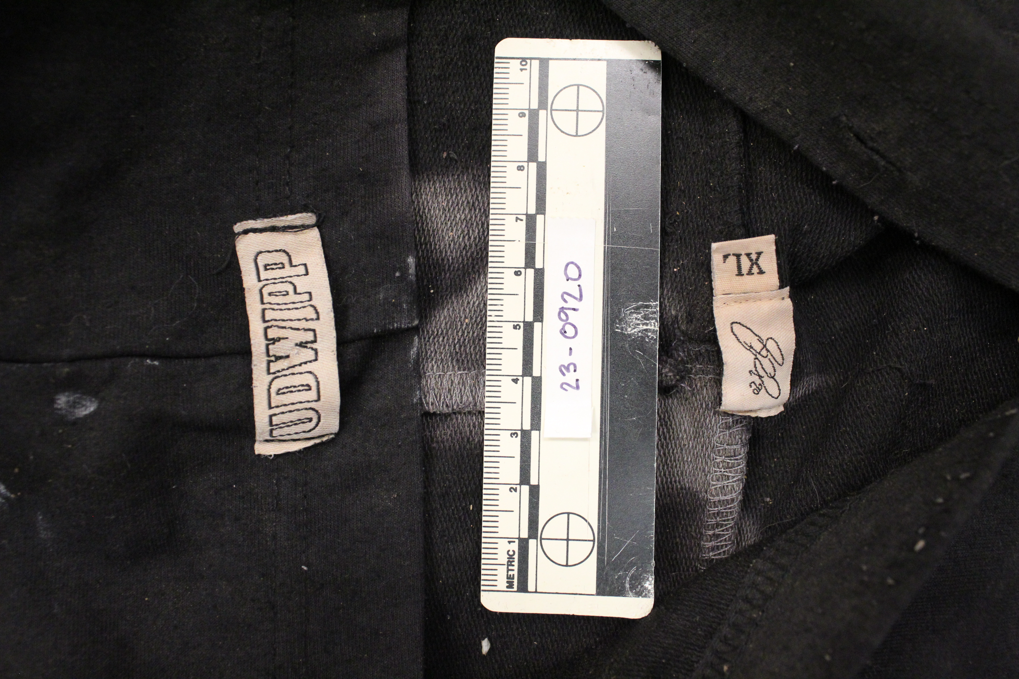 NamUs UP103660 — Tags on black hoodie sweatshirt